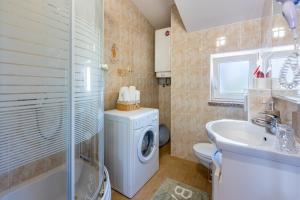 Koupelna v ubytování Apartments Villa Bare + 37 fotografií