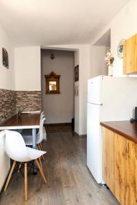 Kuchyň nebo kuchyňský kout v ubytování Elekes Apartmans