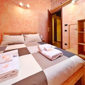 Кровать или кровати в номере La locanda dei fedeli di Vitorchiano