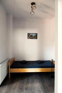 Postel nebo postele na pokoji v ubytování Elekes Apartmans
