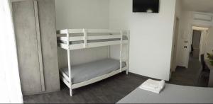 A bed or beds in a room at A Tre Piani Sul Mare
