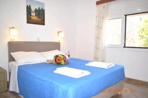 Postel nebo postele na pokoji v ubytování Istron MiraBella Villas
