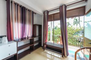 Postel nebo postele na pokoji v ubytování Seaview Deepal villa