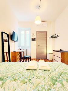 A bed or beds in a room at PH Milano