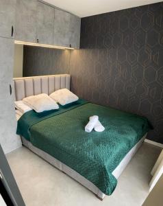 Posteľ alebo postele v izbe v ubytovaní Top Hill apartmán - Kubínska hoľa