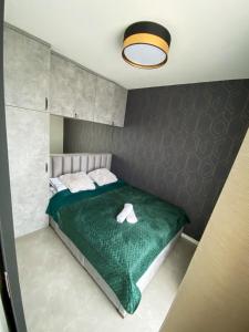 Posteľ alebo postele v izbe v ubytovaní Top Hill apartmán - Kubínska hoľa