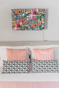 Ένα ή περισσότερα κρεβάτια σε δωμάτιο στο Joy Spot