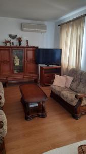 a living room with a couch and a table at MERICA Kneže in Korčula
