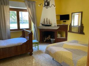 A bed or beds in a room at B&B Calecatine
