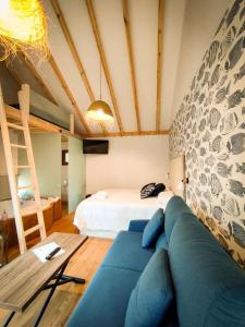 A bed or beds in a room at Cabanas de Udra
