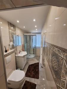 ห้องน้ำของ Ferienhaus Larina
