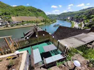 an aerial view of a house with a river at Ferienhaus Larina in Cochem