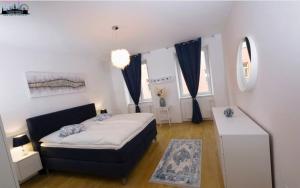 Postel nebo postele na pokoji v ubytování Elegante Unterkunft l BG7