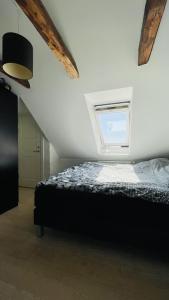 Ένα ή περισσότερα κρεβάτια σε δωμάτιο στο ApartmentInCopenhagen Apartment 1490