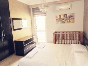 Postel nebo postele na pokoji v ubytování Grand Appartement à 5 min de la mer et de la mosqué hassan II de Casablanca