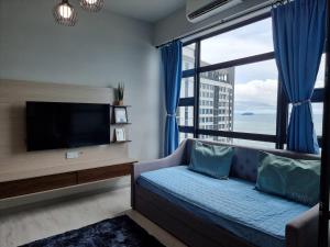 Katil atau katil-katil dalam bilik di Nana Homestay - Jesselton quay