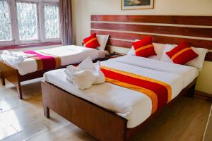 Letto o letti in una camera di Hotel ThorongLa Thamel