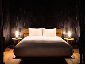 SHIROIYA HOTEL客房内的一张或多张床位
