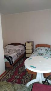 Postel nebo postele na pokoji v ubytování Guest House Regina