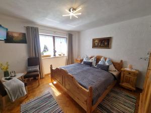 A bed or beds in a room at Holiday Home Muhr near Katschberg Ski Area Még 28 kép