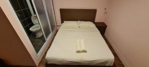 Postel nebo postele na pokoji v ubytování Misto Hotel
