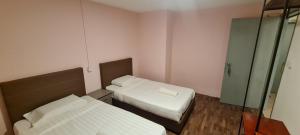 Postel nebo postele na pokoji v ubytování Misto Hotel