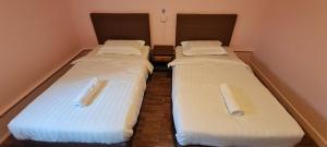 Postel nebo postele na pokoji v ubytování Misto Hotel