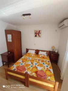 Postel nebo postele na pokoji v ubytování Apartments Vala