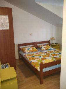 Postel nebo postele na pokoji v ubytování Apartments Vala