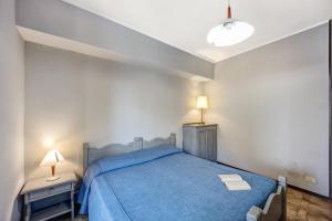 Un ou plusieurs lits dans un hébergement de l'établissement E2-2 bilocale superior Borgo Rovere