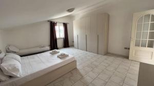 Postel nebo postele na pokoji v ubytování Casa del Minatore 1 - Gonnesa