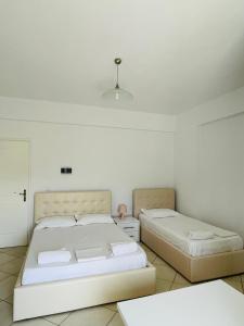 Postel nebo postele na pokoji v ubytování Orea Hotel
