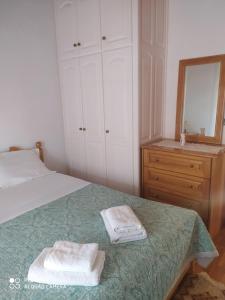 Postel nebo postele na pokoji v ubytování Villa Magdalini
