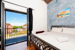 Posteľ alebo postele v izbe v ubytovaní Villa Baraka with private pool near Rovinj - WiiBuk + 37 fotografií