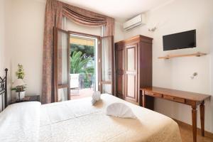 Postel nebo postele na pokoji v ubytování Country Hotel Residence Da Pilade