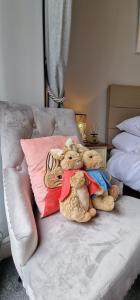 Säng eller sängar i ett rum på Bonny Brae House by Woodland Park