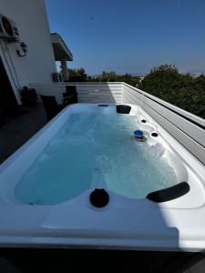 a hot tub sitting on top of a roof at B&B Villa Nunzia in Ercolano