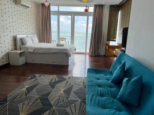 a living room with a bed and a couch at Nancy Grand Vung Tau Villa 5 in Xã Thang Tam +75 photos
