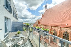 Balkón alebo terasa v ubytovaní Apartament Prezydencki bulwary Stare Miasto Apartamenty No 1