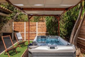 Posezení v ubytování Diamanti Residence Beachside White apt-Ligaria + 1 fotografie