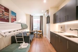 Η κουζίνα ή μικρή κουζίνα στο BILBAO RIVERSIDE by STAYNN APARTMENTS