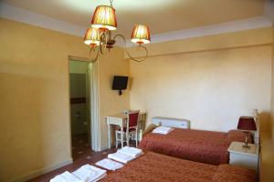 Posteľ alebo postele v izbe v ubytovaní Agriturismo Monticelli