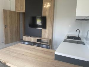 Kuchyň nebo kuchyňský kout v ubytování NOVA Apartamenty&Pokoje