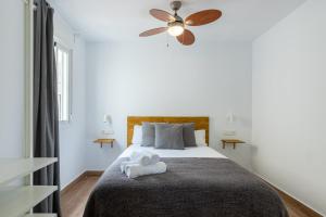 Posteľ alebo postele v izbe v ubytovaní FUN BUILDING TERRACES by HOMEABOUT