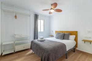 Posteľ alebo postele v izbe v ubytovaní FUN BUILDING TERRACES by HOMEABOUT