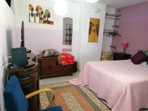 Postel nebo postele na pokoji v ubytování Lisbon Coast Flat