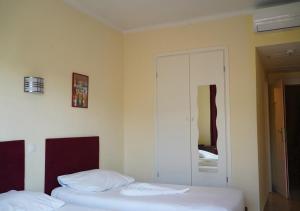 Posteľ alebo postele v izbe v ubytovaní Das Hostal