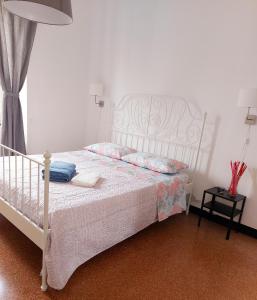 Postel nebo postele na pokoji v ubytování Brignole C Genova Rooms