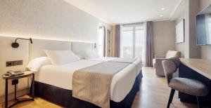 Postel nebo postele na pokoji v ubytování Hotel Ilunion San Sebastián + 37 fotografií