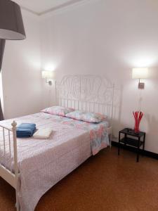 Postel nebo postele na pokoji v ubytování Brignole C Genova Rooms